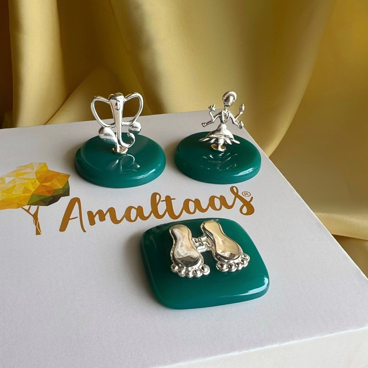Ganesh Ji, Lakshmi Ji and Charan handcrafted in BIS certified 92.5 Silver on natural green onyx, a Diwali gift set by Amaltaas