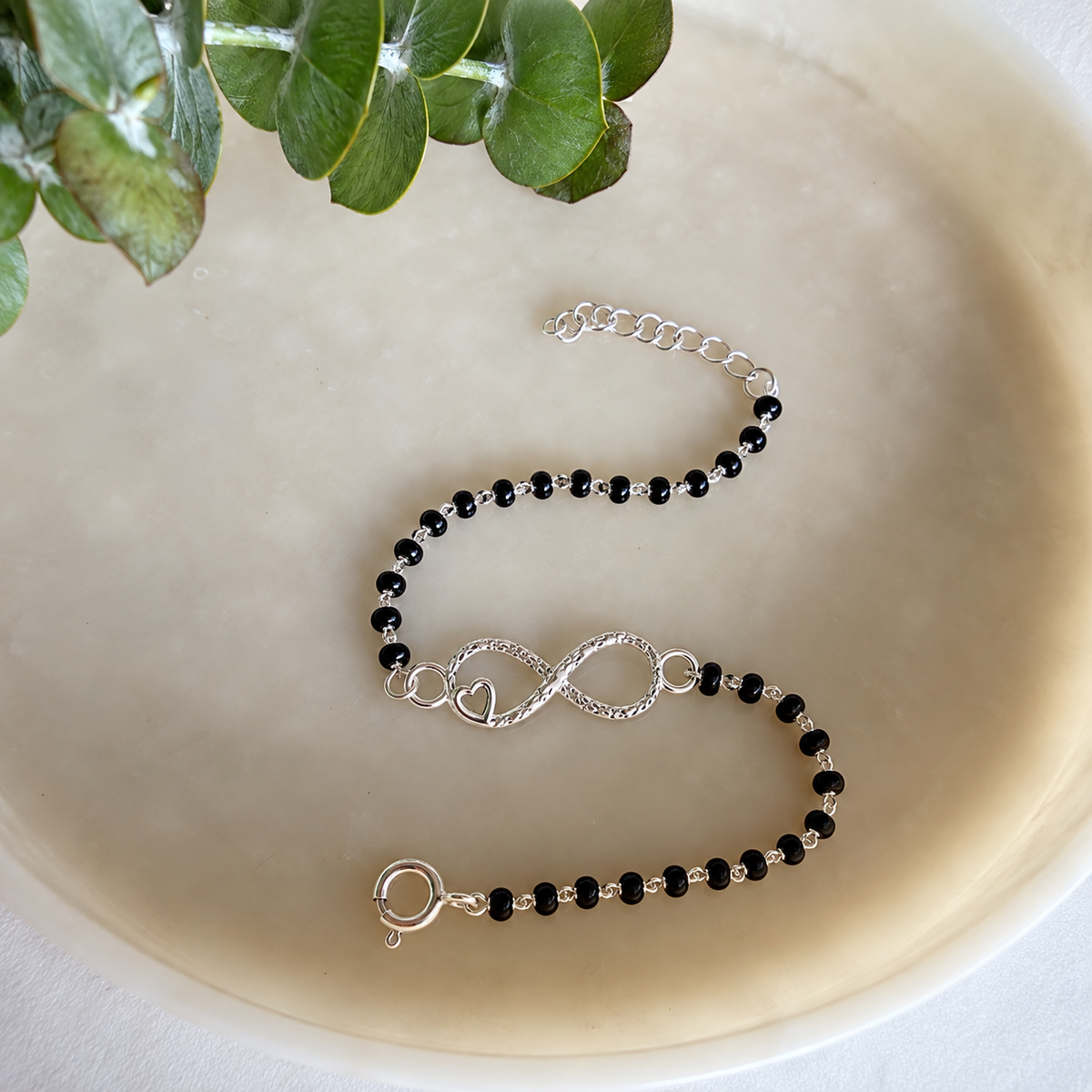 Infinity charm in 92.5 silver on black onyx nazariya, Amaltaas