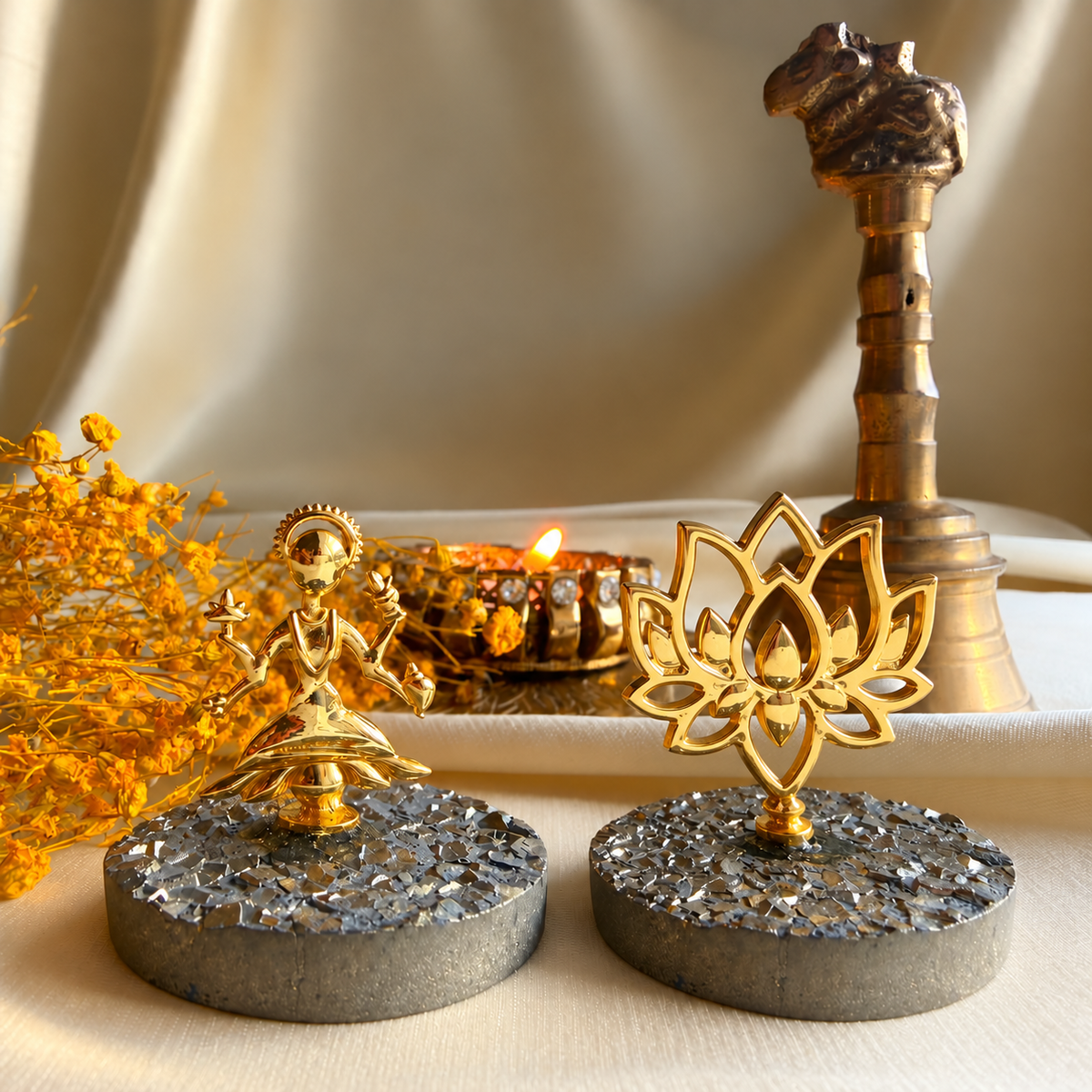 Prosperity Pair: Maa Lakshmi and Prosperity Lotus in 22k gold-plated brass on natural pyrite gemstone, with diya and brass bell