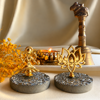 Prosperity Pair: Maa Lakshmi and Prosperity Lotus in 22k gold-plated brass on natural pyrite gemstone, with diya and brass bell