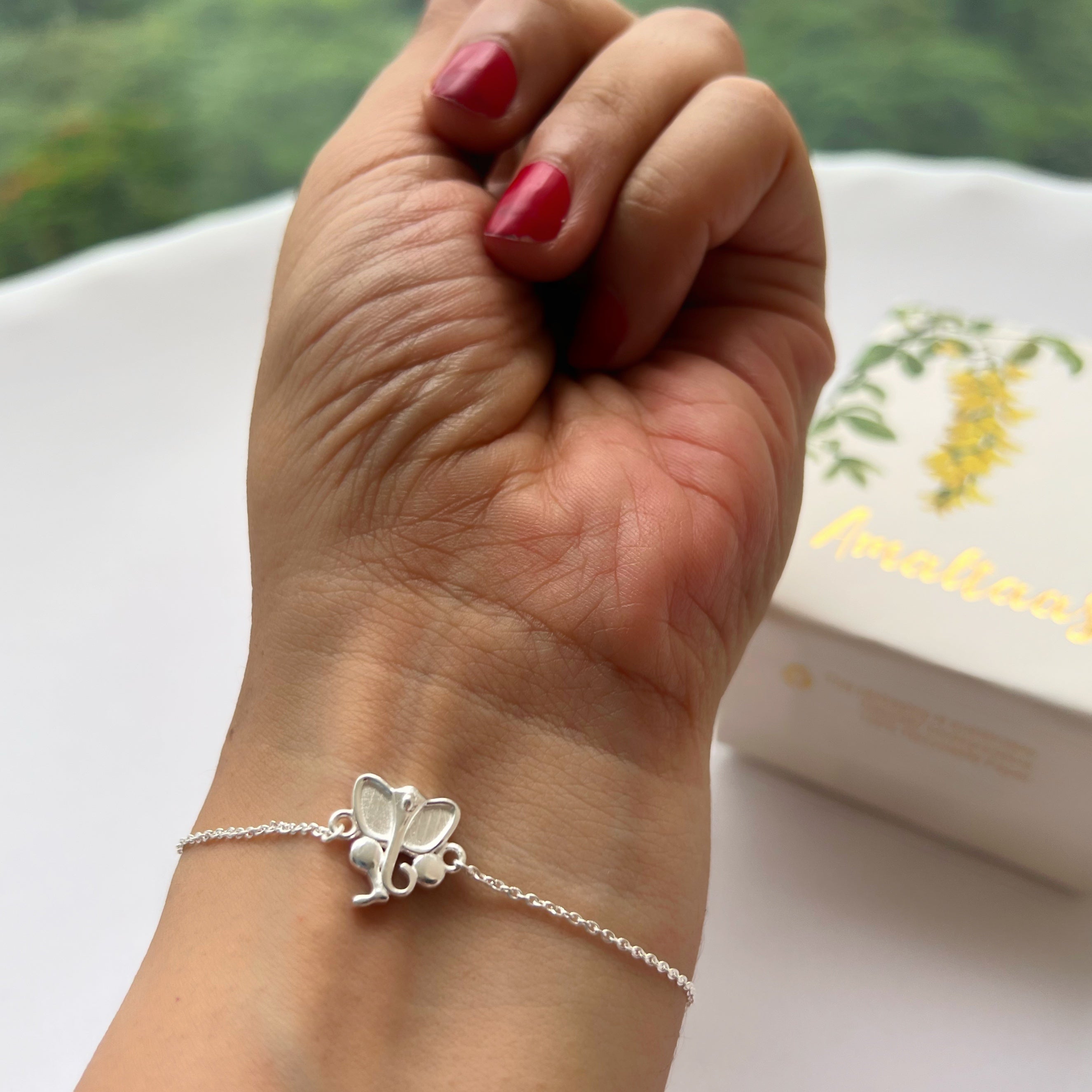 Silver ganesh bracelet discount