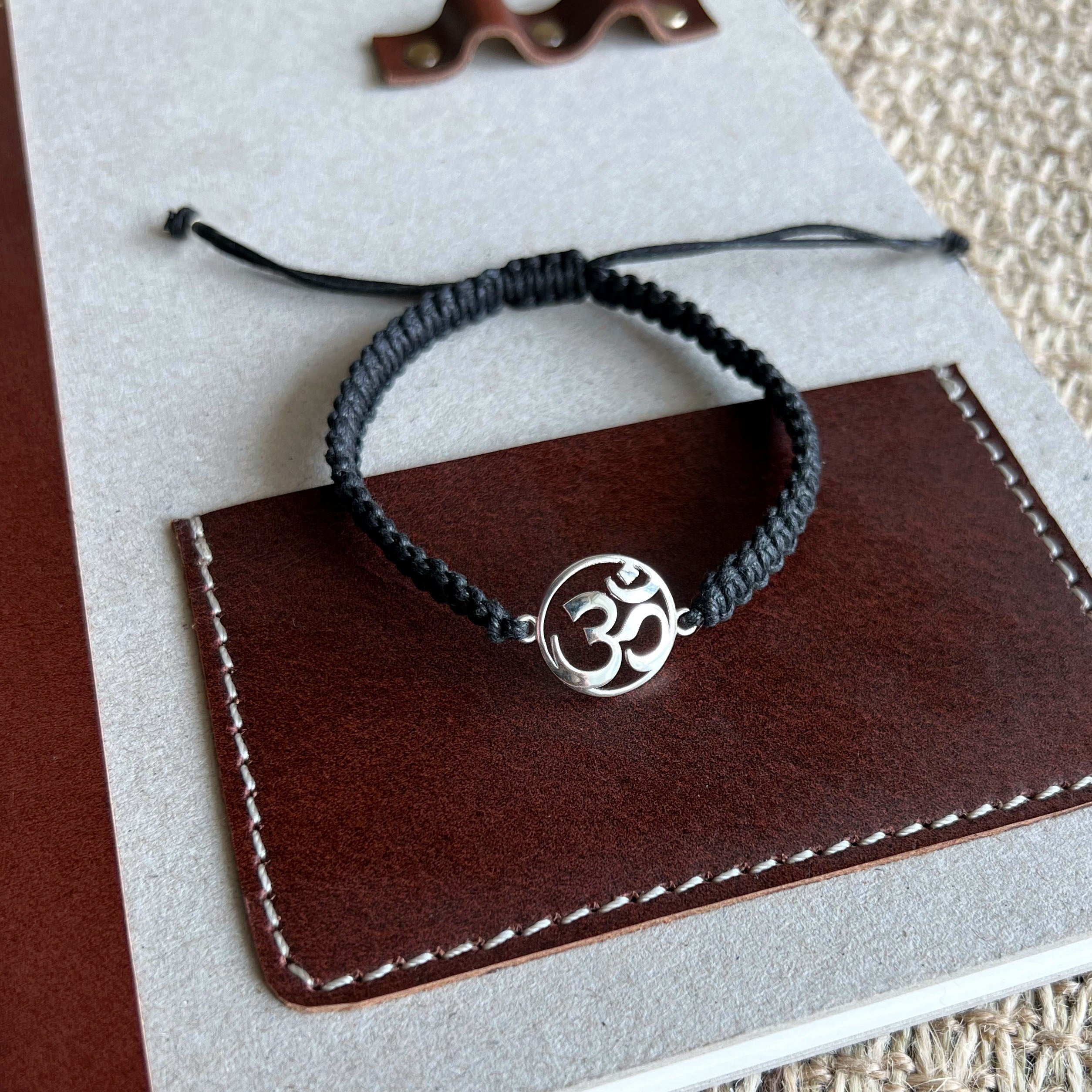Om bracelet with black thread on sale