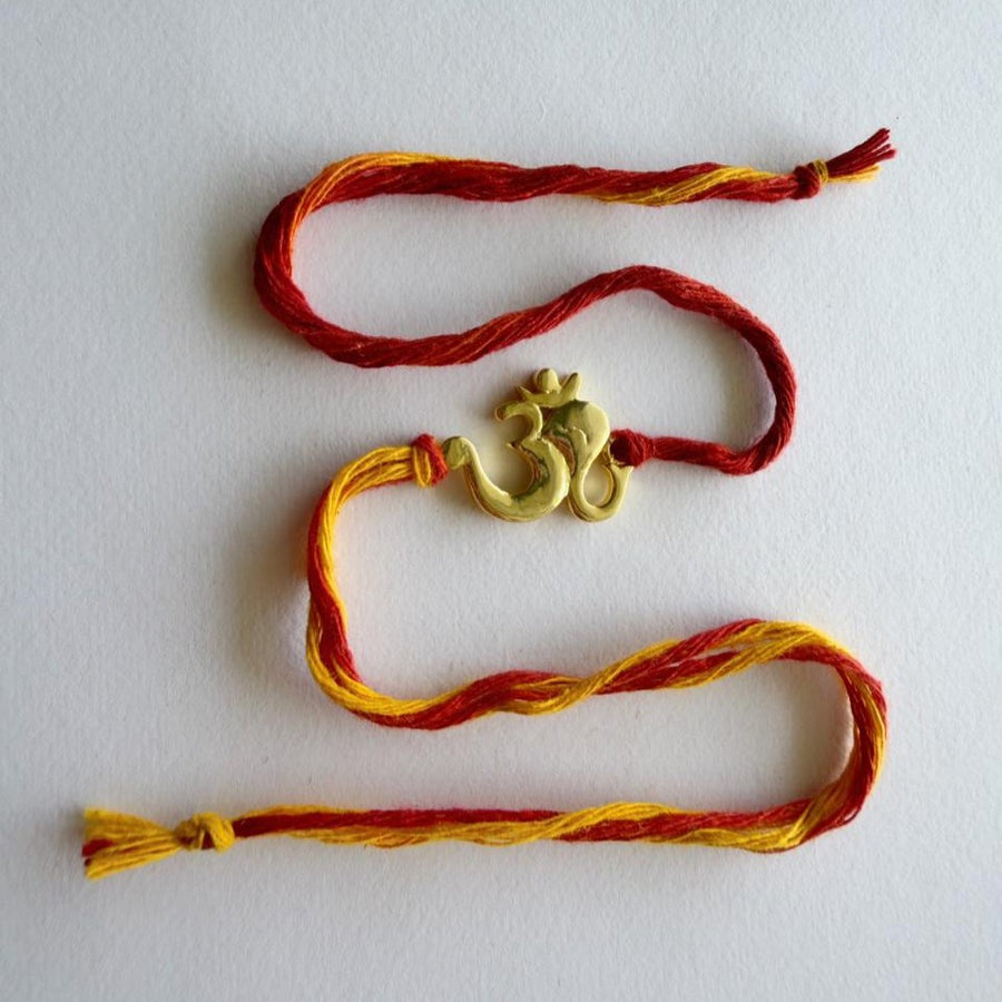 RAKHI- 22k Shubh Om Ganesh Gold-plated