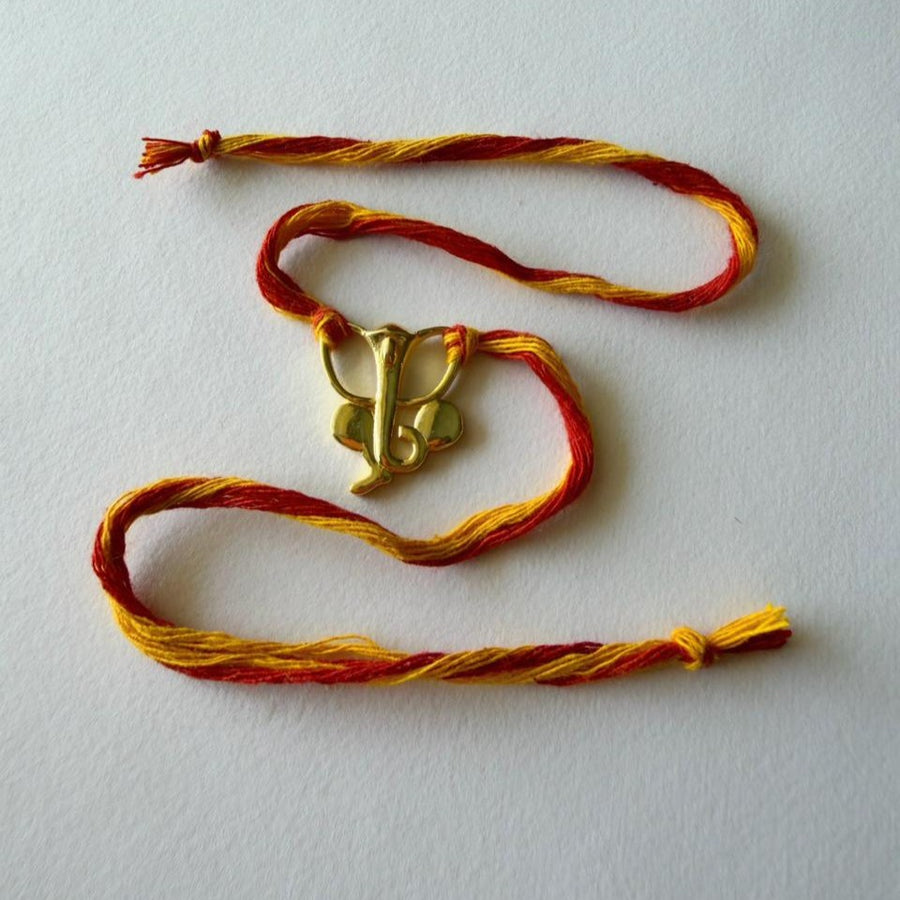 RAKHI-22k-Ganesh ji Gold-plated