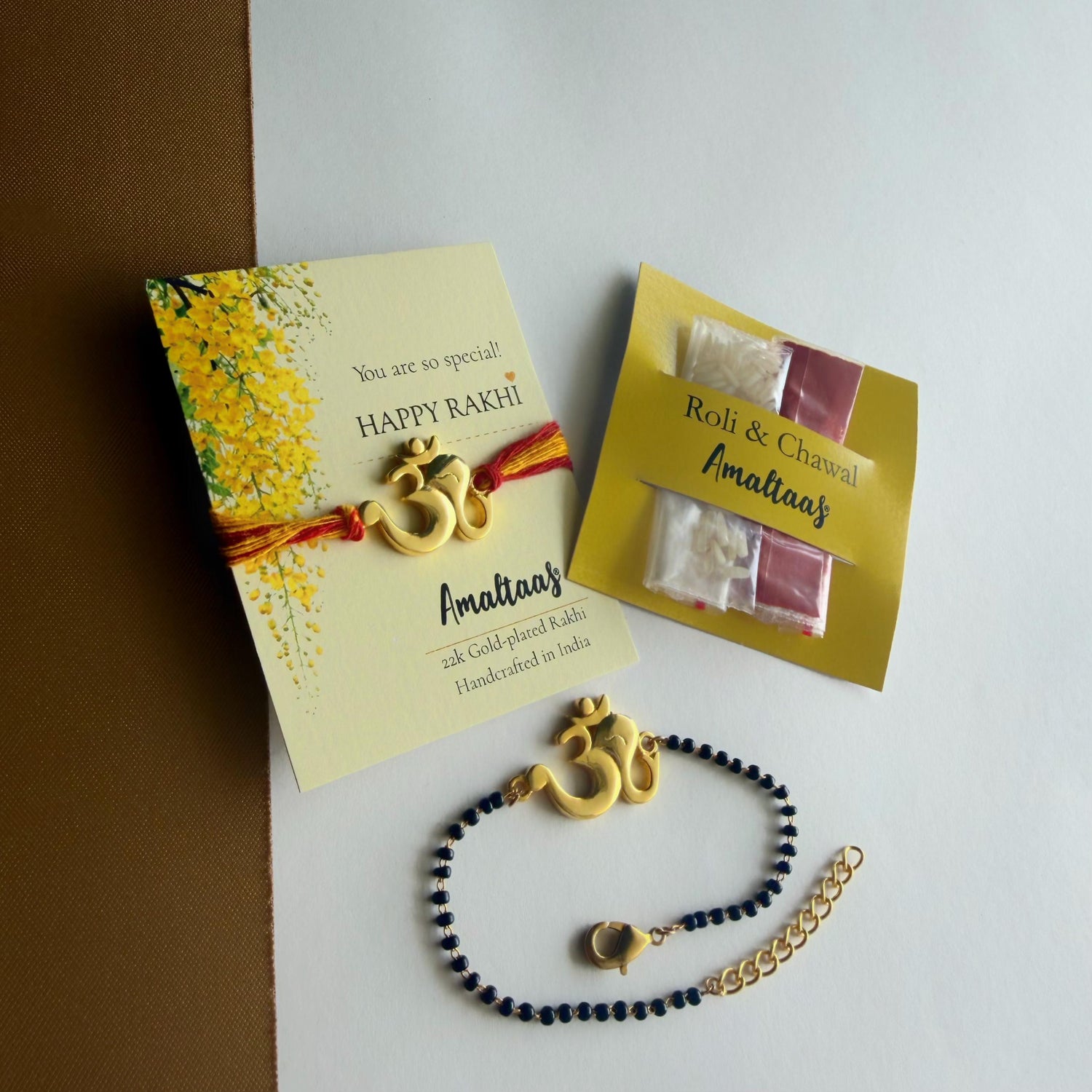 22K COMBO RAKHI - Om Ganesha Gold-plated For Bhai & Bhabi
