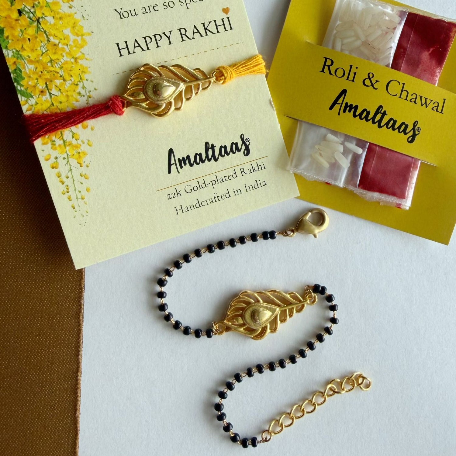 22K COMBO RAKHI - Kanha Morpankh Gold-plated For Bhai & Bhabhi