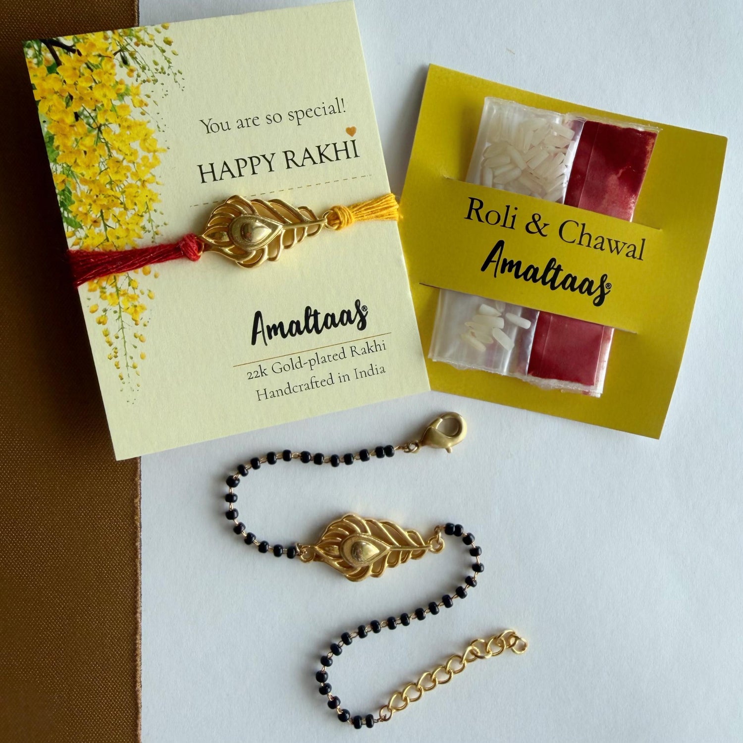 22K COMBO RAKHI - Kanha Morpankh Gold-plated For Bhai & Bhabhi