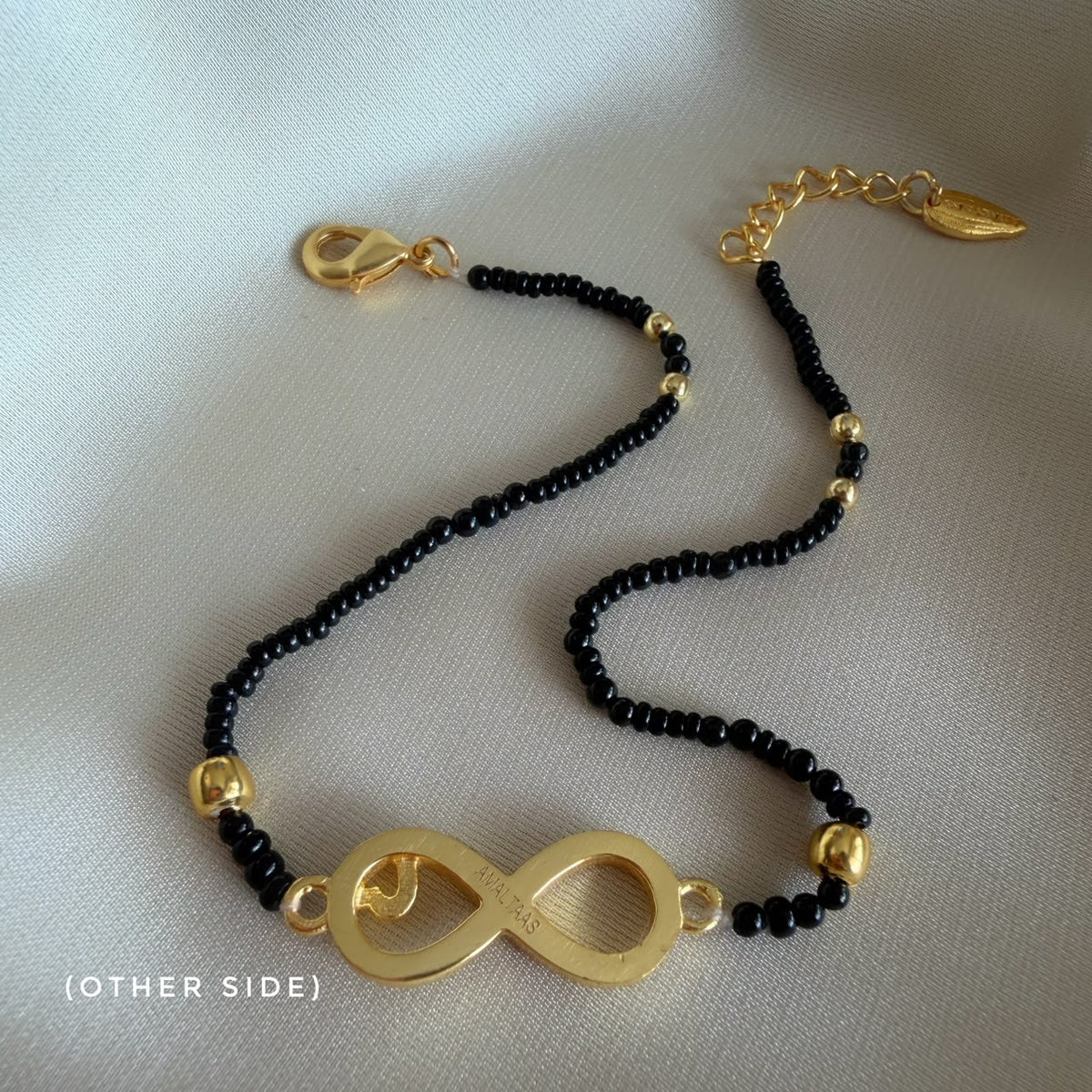 22k gold-plated Infinite Love anklet with black onyx beads, Amaltaas