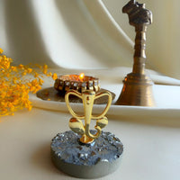 Ganesh Ji in 22k gold-plated brass on natural pyrite base, handcrafted by Amaltaas