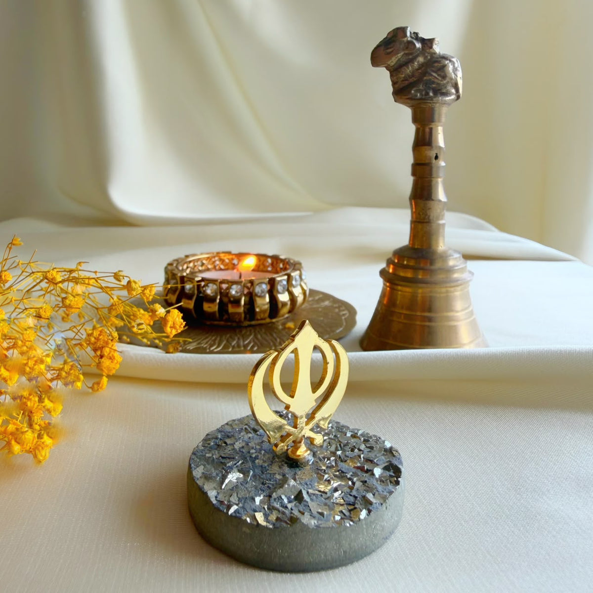 Khanda in 22k gold-plated brass on natural pyrite gemstone base, handcrafted by Amaltaas