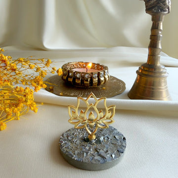 Prosperity Lotus gold-plated motif on pyrite gemstone with diya and brass bell
