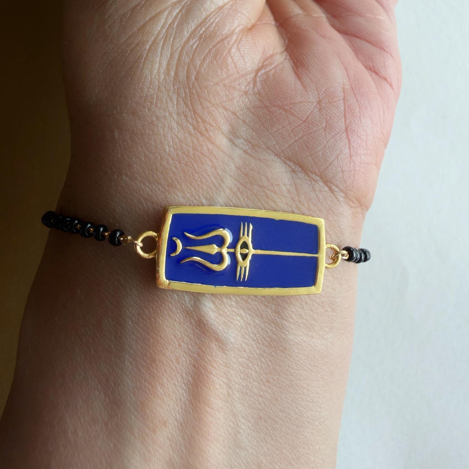 Women Neelkanth Trishul 22k Gold-plated Brass Bracelet with Black Onyx