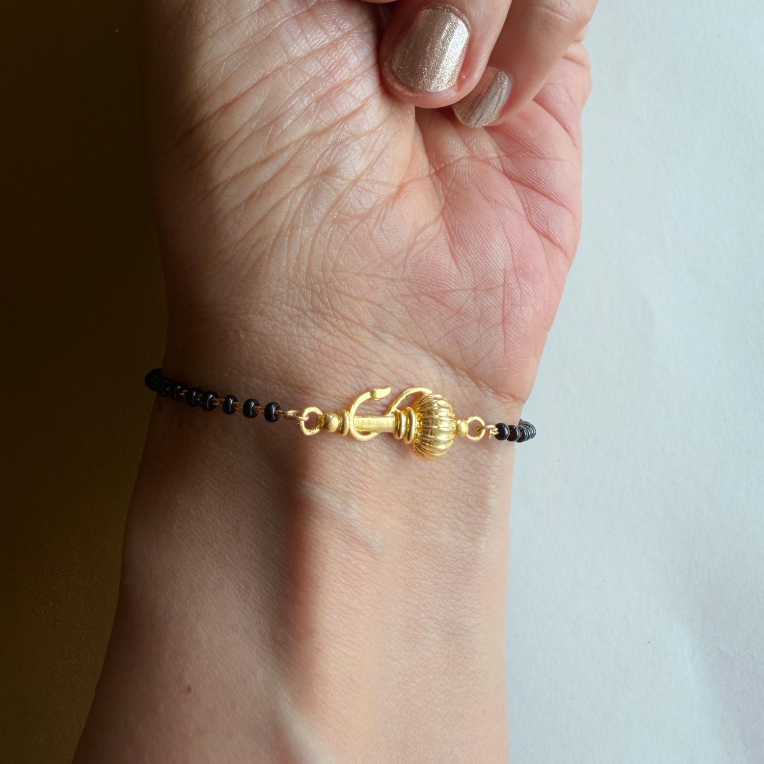 Women Vayuputra Gada 22k Gold-plated Brass Bracelet with Black Onyx