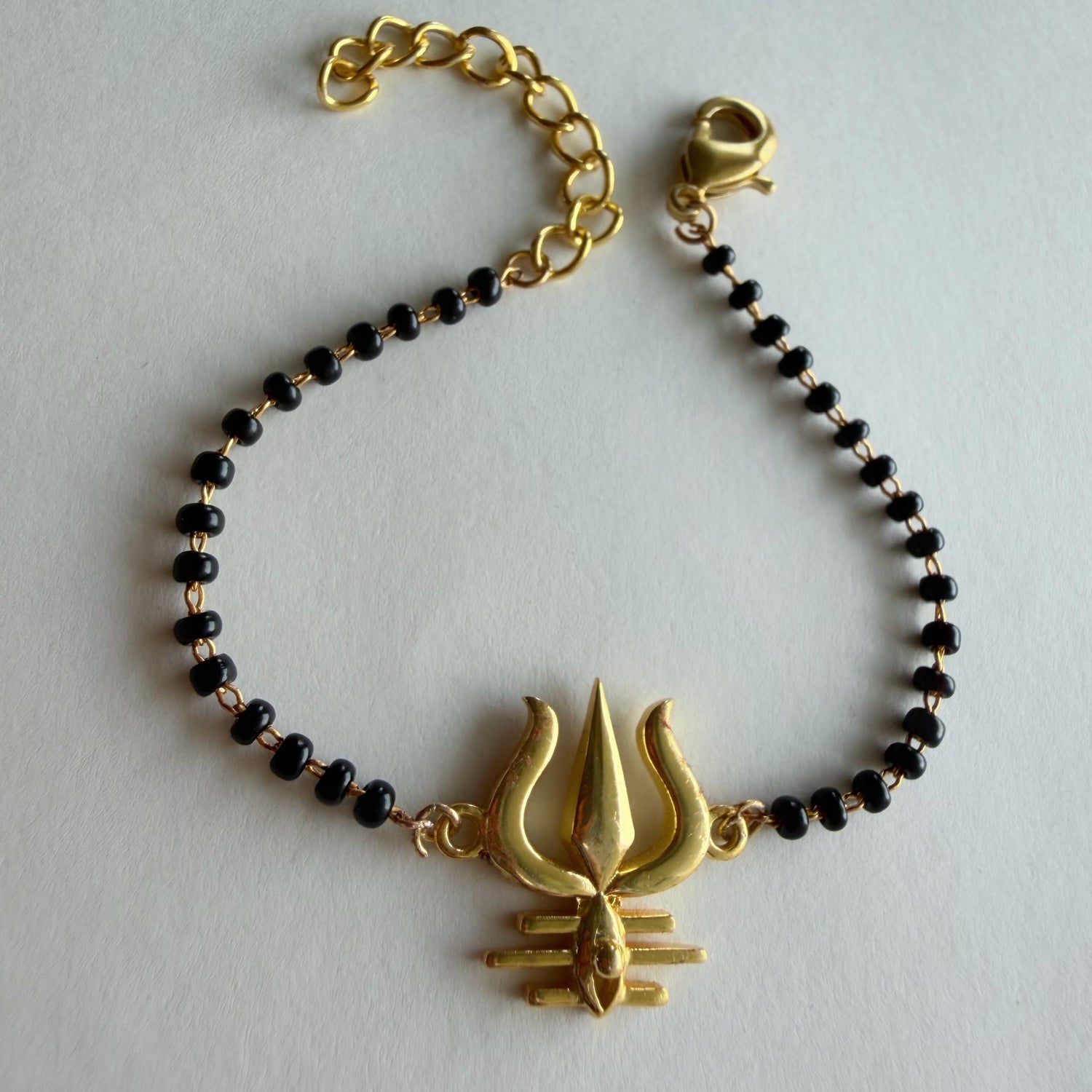 Women Mahadev's Trishul 22k Gold-plated Brass Bracelet with Black Onyx