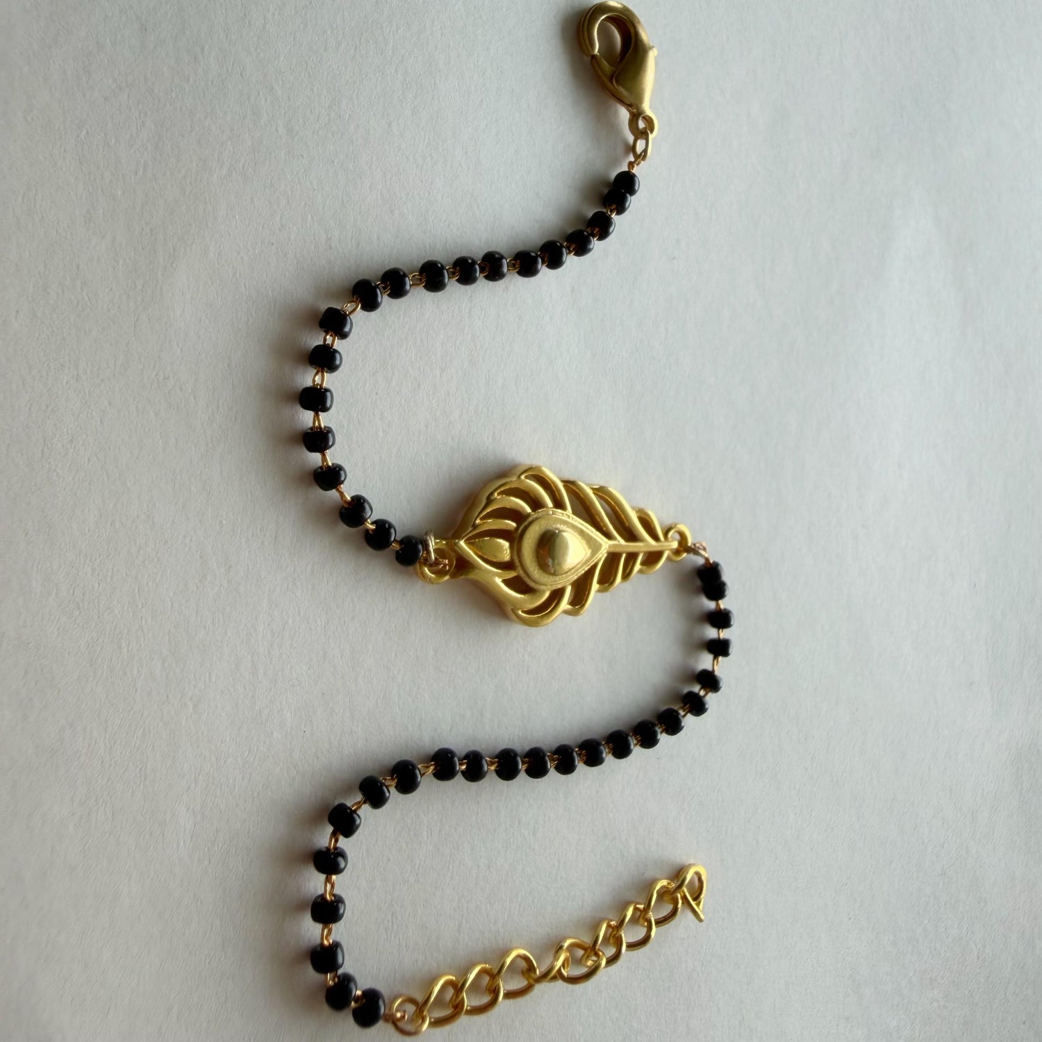 Women Kanha Morpankh 22k Gold-plated Brass Bracelet with Black Onyx