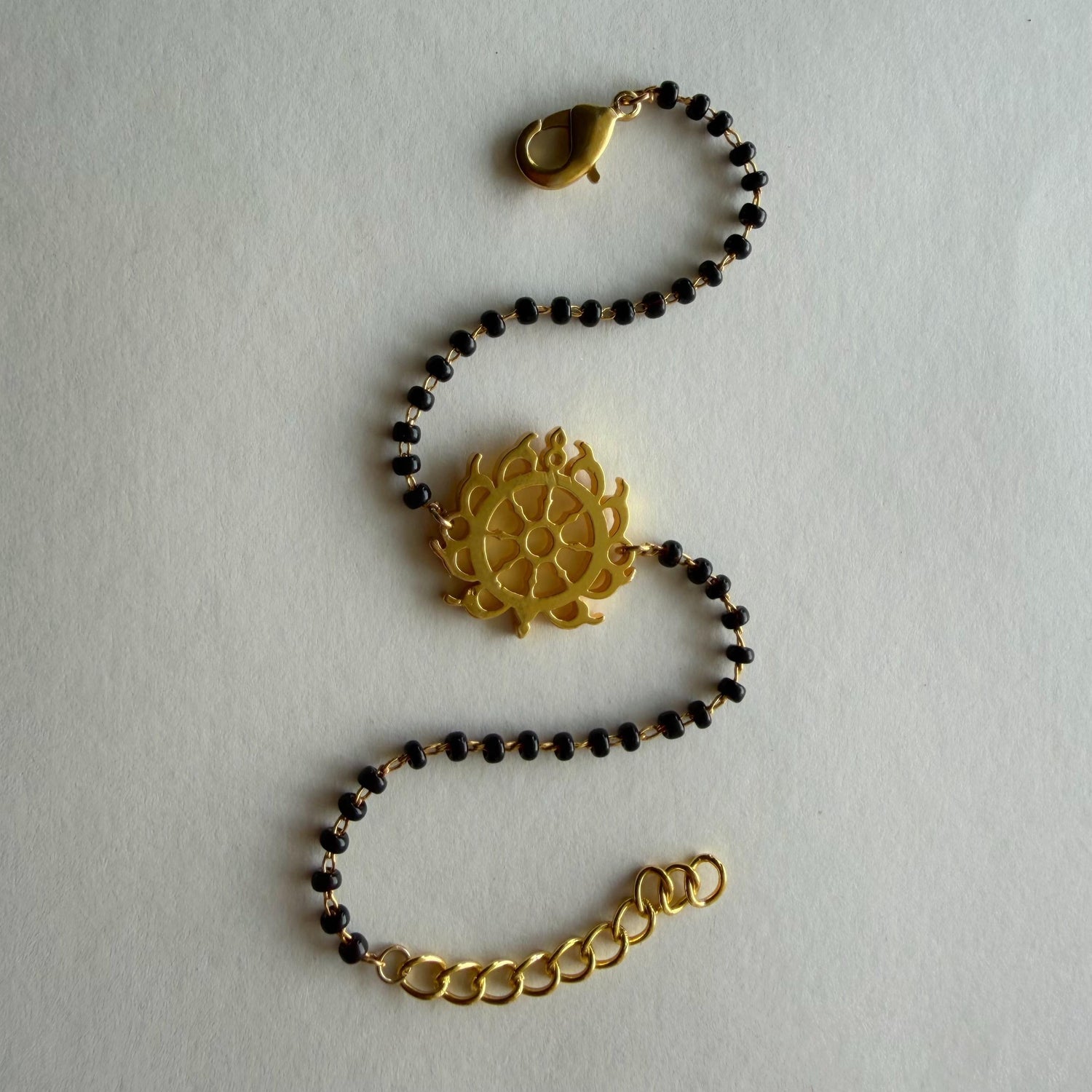 Women Sudarshan Chakra 22k Gold-plated Brass Bracelet with Black Onyx