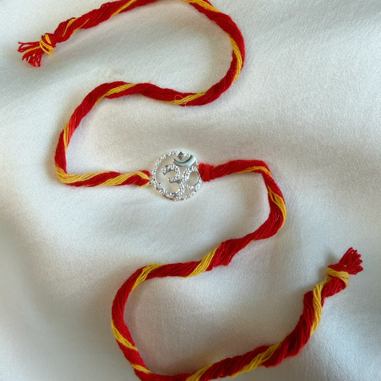 SILVER RAKHI - Eternal OM 92.5 Silver