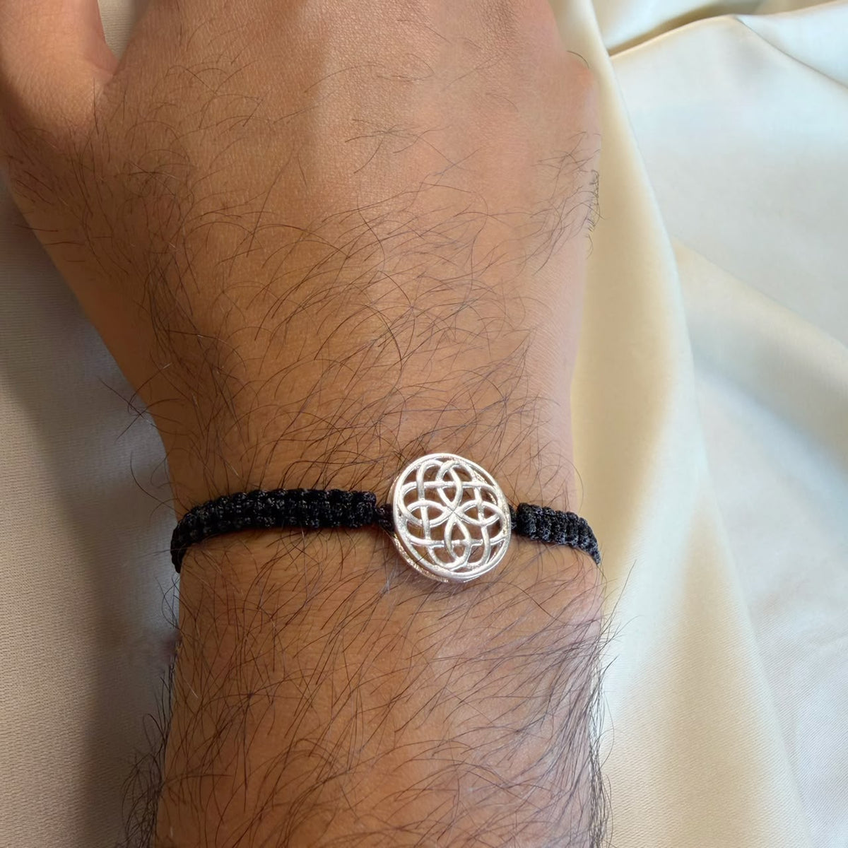 Celtic Knot unisex silver bracelet worn, Amaltaas
