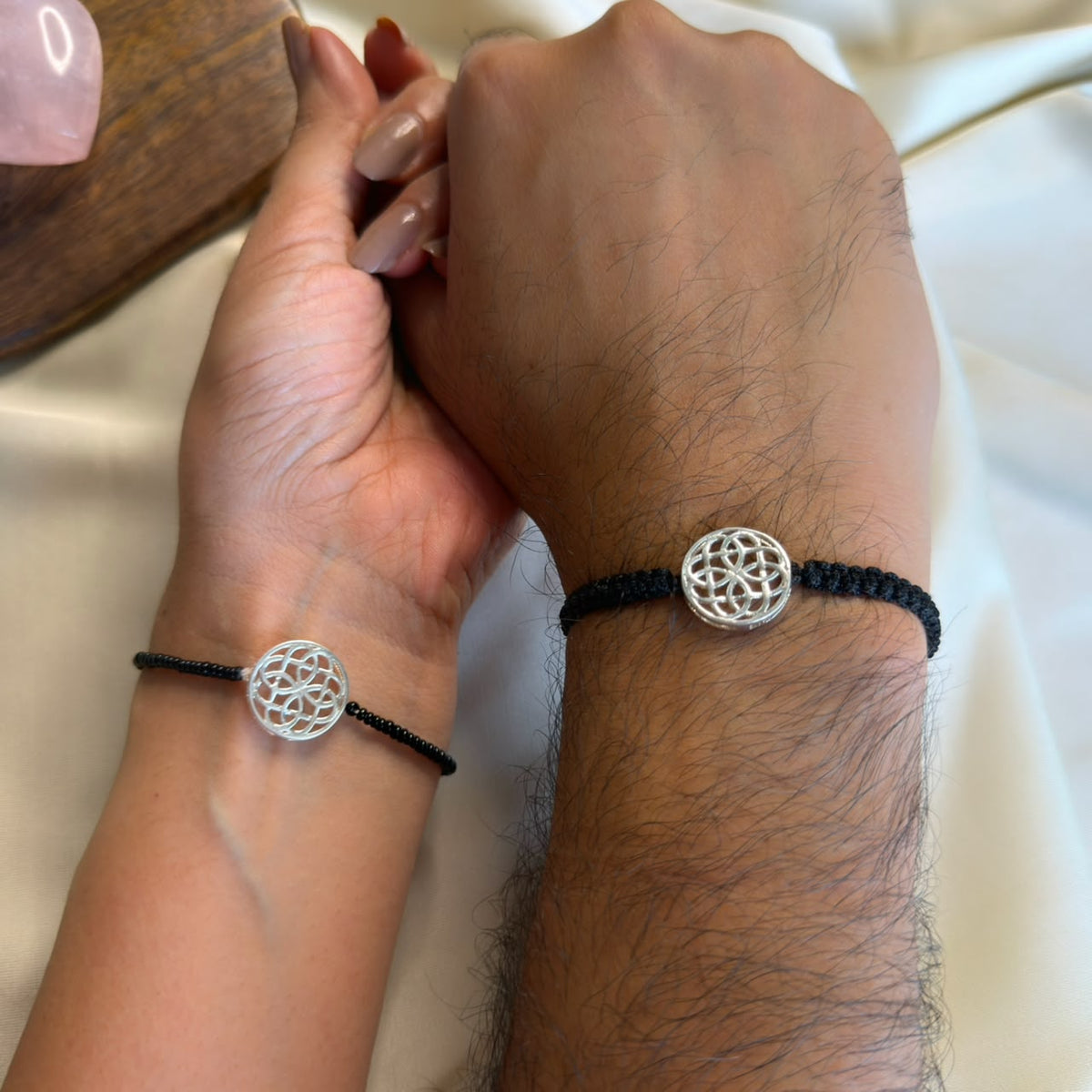 Couple Celtic Knot silver bracelets worn together, Amaltaas