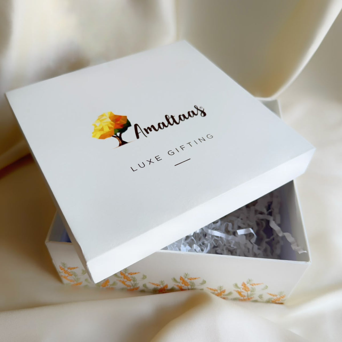 Amaltaas Luxe Gifting Box with lid lifted, for the Maa Lakshmi Ganesh Ji pair